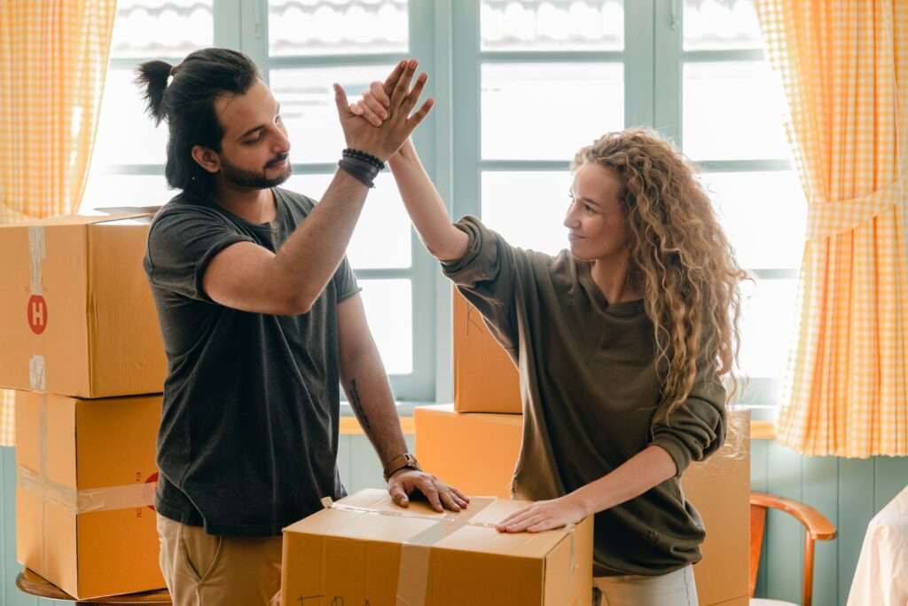 couple packing and moving household goods by themselves