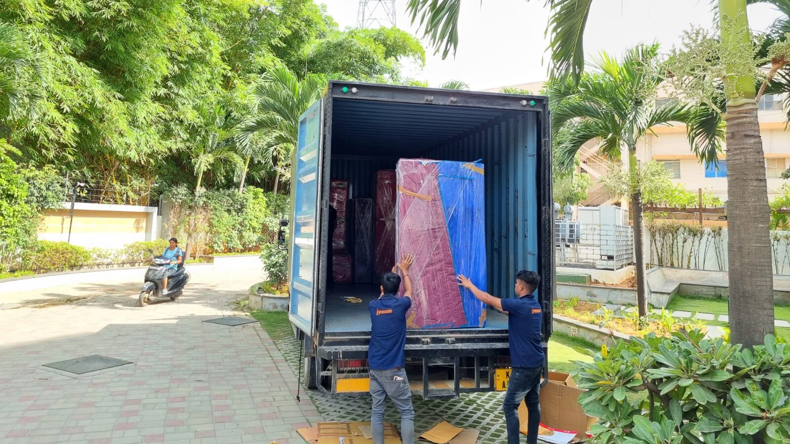 GoSmart Movers team loading into the truck